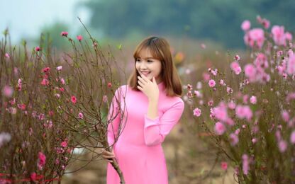 Vietnamese women wear Ao in the rain. Ao dai is famous traditional custume  for woman in Vietnam. #5 Photograph by Huynh Thu - Pixels